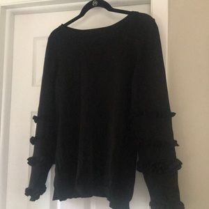 Black sweater with ruffle sleeves